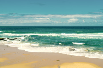 Soft wave of blue ocean on white sand beach , Seascape background