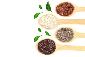 Black red white quinoa and chia seeds in wooden spoon isolated on white background with copy space for your text