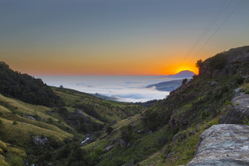Low clouds in the valley at sunrise