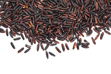 Black wild rice isolated on white background with copy space for your text. Top view. Flat lay