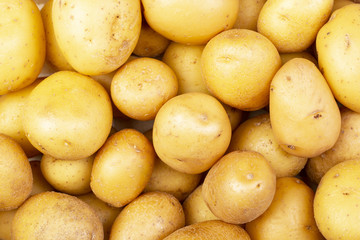 Background of fresh potatoes. Top view.
