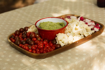 Fresh vegetable snacks prepared on a table during camping trip