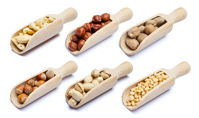 Set of Scoops full of nuts isolated on white
