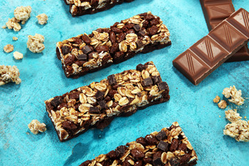 Granola bar. Healthy sweet dessert snack. Cereal granola bar with nuts and chocolate.