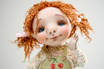 Porcelain clay young smiling redhead girl