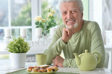 Senior man drinking tea
