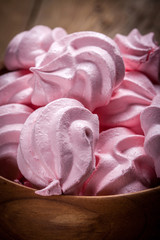 Pink meringue cookies.