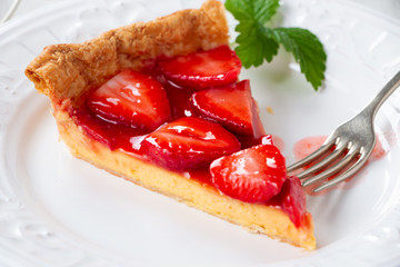 Portion of strawberry tart on a plate