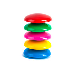 Colorful magnets - holders on a white background