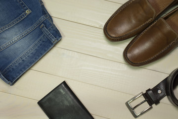 Set of mans fashion and accessories on wooden background