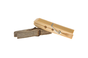new wooden and old clothespin on a white background