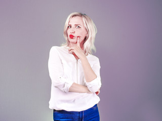 Pissed off by an angry angry middle-aged pessimistic woman with a bad attitude of thinking looks at you Negative emotions of a person's facial expression of a feeling of reaction