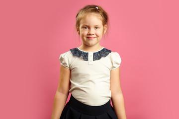 Frontal portrait of beautiful little girl in shape.