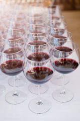 Champagne glasses being served on a party