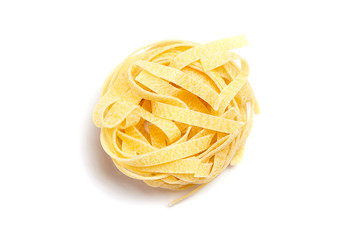 Tagliatelle italian pasta isolated on white background