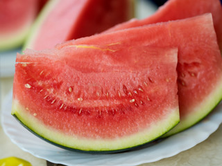 cut slices of watermelon on a plate