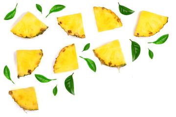 Naklejka premium Sliced pineapple decorated with green leaves isolated on white background with copy space for your text. Top view