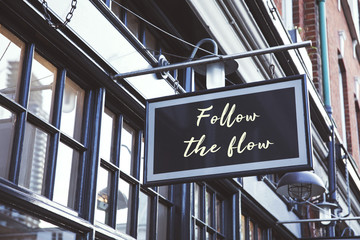 Obraz premium Stylish empty mock up signboard on classical architecture building. Very modern shape for resturants, shops, barbers, store, open space. 