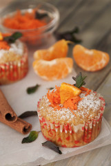 Carrot Healthy Muffins Cupcakes Buns on a WoodenRustic board. Homemade Food.