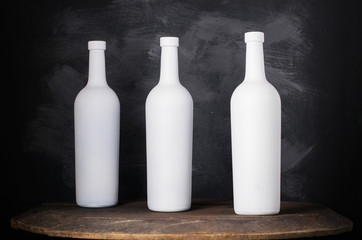 Wine Bottle Mock-Up. Red Wine bottle on wooden background