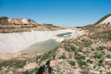 Volkovysk chalkpits or Belarusian Maldives is a beautiful saturated blue lakes. Famous chalk quarries near Vaukavysk, Belarus. Developed for the needs of Krasnaselski plant construction materials. 
