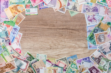 Frame from different banknotes with empty space in centre