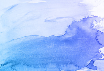 Blue watercolor paint background.