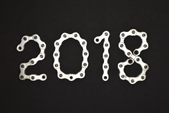 bike chain year 2018 on dark background