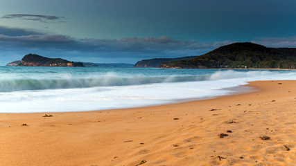 Fototapeta premium Sunrise Seascape with Clouds and Beach