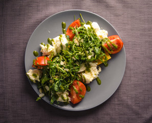 Salad with cheese and tomatoes