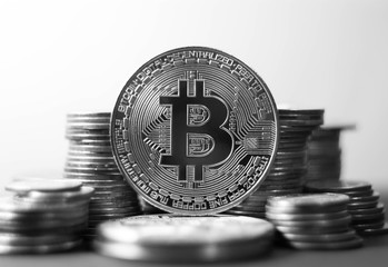 Bitcoin gold coin. Cryptocurrency concept. Virtual currency background black and white photo