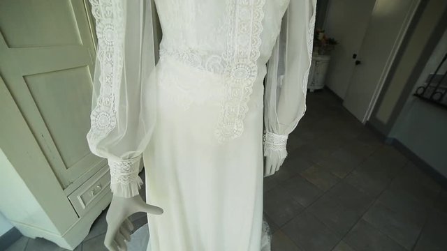 Tilt down, bridal outfit on mannequin