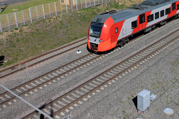 Fototapeta premium Red train on a railway
