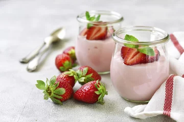 Foto auf Leinwand Natural strawberry yogurt with fresh berry and mint. © lilechka75