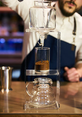Fototapeta na wymiar Barista Prepare Coffee Working Order Concept. Bartender preparing coffee drink