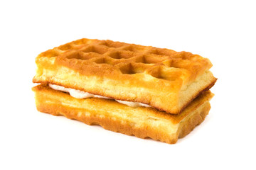 Soft waffles with a filling. Wafers with cream filling on white background.