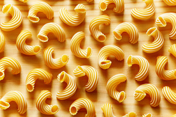 Pasta on a wood background closeup