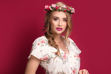 Beauty female model with flowers headband.