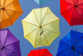 Umbrellas in the sky