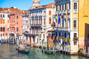 Venice, Italy. Beautiful Venice narrow canals, with many classic gondolas, amazing old rusty...