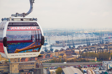 The one kilometre, 0.63 mile, long cable car link travels 90 metres, above the River Thames from...