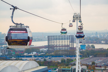 The one kilometre, 0.63 mile, long cable car link travels 90 metres, above the River Thames from...