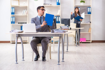 Man and woman working in the office
