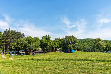 Fototapeta premium Fruska Gora, Serbia May 01, 2018: International Labor Day. People celebrate the holiday in the forest. This is located for Fruska Gora and Andrevlje.
