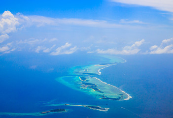 Amazing Bird's-eye view of Maldives atolls from a sea plane.