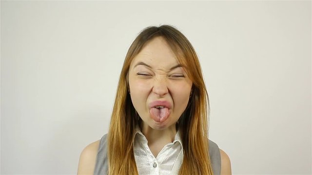 The girl's facial expression shows emotions in front of the camera