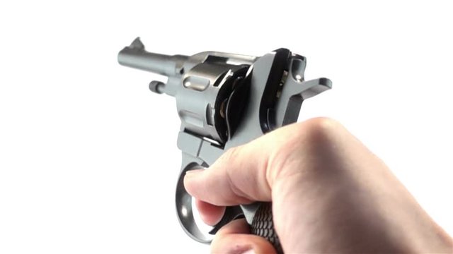 Man Shooting a Revolver on White Background in Super Slow Motion 1000 fps