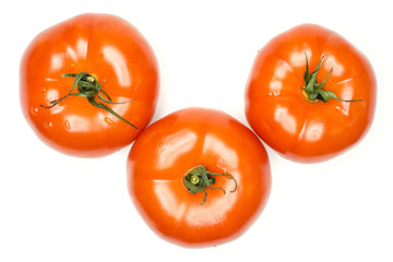 Three red tomato with vine ends top view isolated on white background fresh whole.