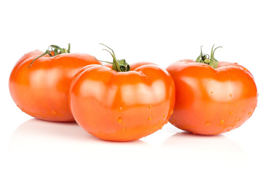 Three Red Tomato Stack With Vine Ends Isolated On White Background Fresh Whole.