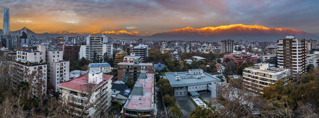 Fototapeta na wymiar Sunset over Santiago de Chile city, an amazing and colorful skyline